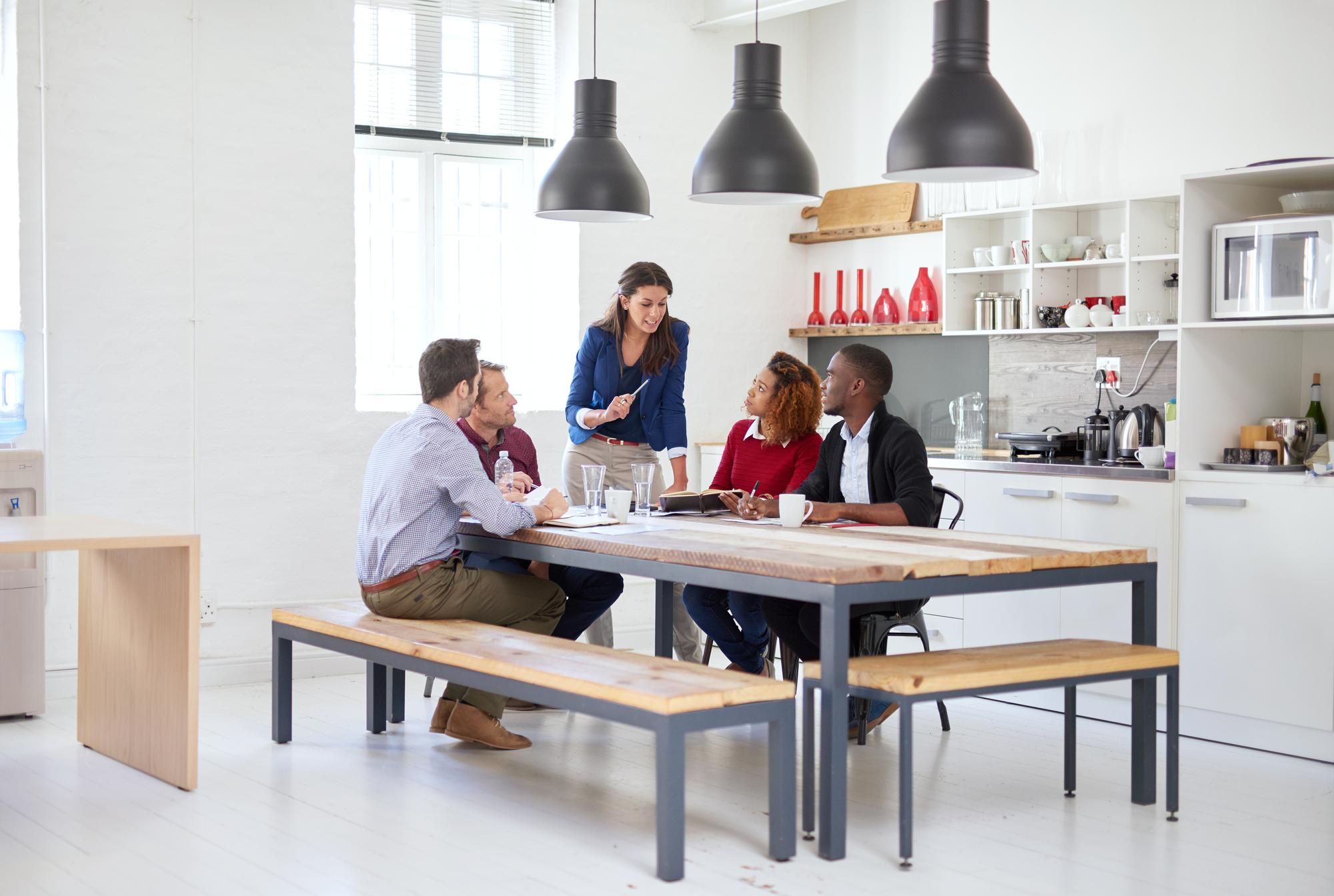 Consultation meeting in kitchen workspace